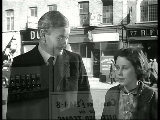 In the background is 77 Wilton Road on the corner of Longmoore Street, Circa 1958