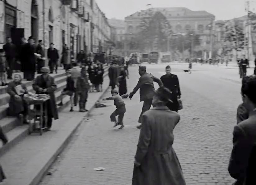 The view along Piazza Cavour with the Chiesa di Santa Maria delle Grazie in the top left background and the Museo Archeologico Nazionale di Napoli in the distance Circa 1946