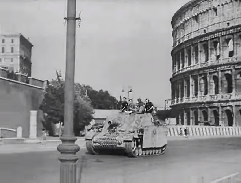 Western site of the Colosseum, running towards Via dei Fori Imperiali.Circa 1946
