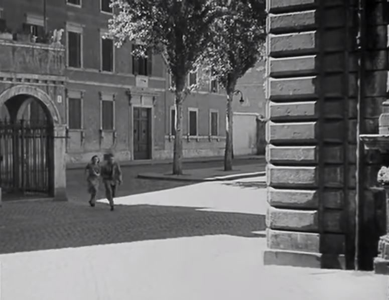 The view from the corner of Piazza Fiammetta and Via degli Acquasparta towards the Palazzo Cesi, behind the trees. Circa 1946