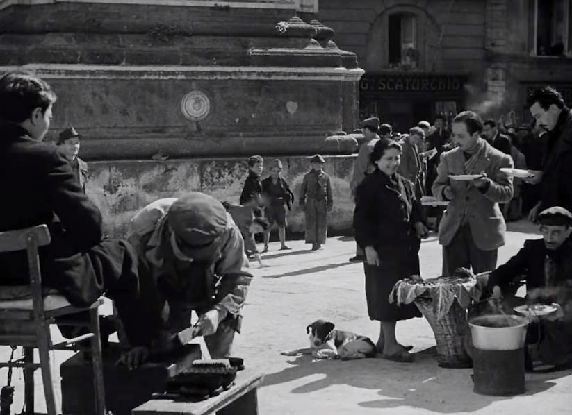 Piazza San Domenico Maggiore with the base of the Obelisco di San Domenico in the background. Circa 1946