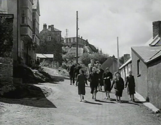 ‘Granville’ on the immediate left with School Hill going off to the left and the villagers on the B3294. Coverack, Cornwall Circa 1949