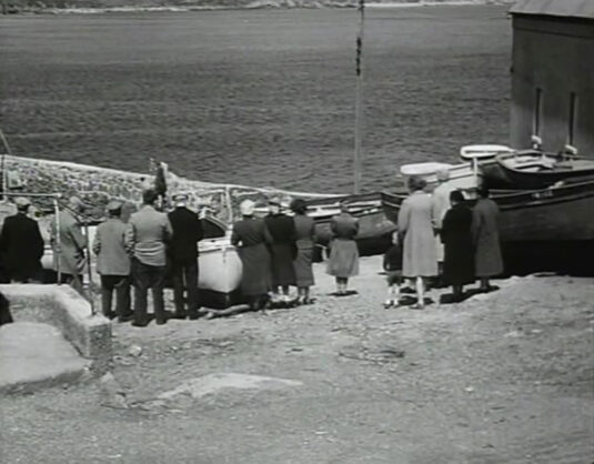 Towards the harbour with the lifeboat station to the right. Coverack, Cornwall, Circa 1949