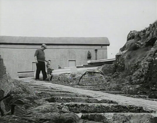 Coverack, Cornwall Lifeboat house in the background and it looks as if those steps remain. Circa 1949