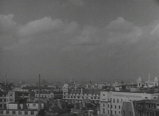 Aerial view of the City of London, including Leadenhall St/Bishopsgate (building with small domed turret just left of center, Lloyds Building (large white building to its right) and botom right hand corner, 39 Lime Street. The camera position at or very near to Plantation House in Mincing Lane. Circa 1949