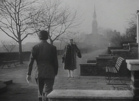 King Edward Memorial Park, London E1 looking west with the spire of St. Paul’s church visible through the mist. Circa 1949