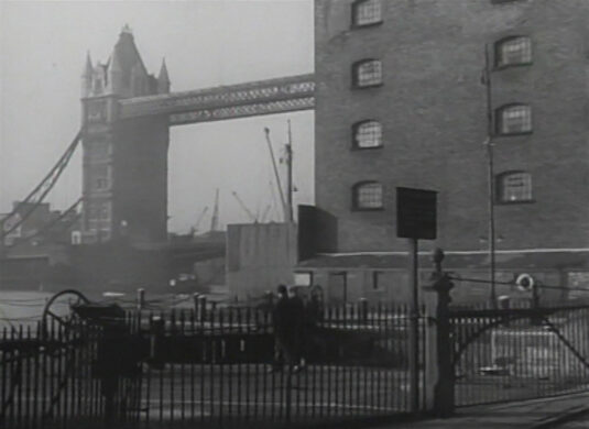 The entrance to St. Katharine Docks looking towards Tower Bridge Circa 1949