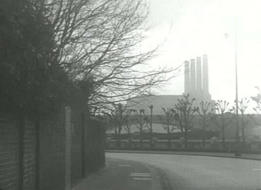 Vicarage Crescent, SW11 looking towards Battersea Bridge and Fulham Power Station, Townmead Road, SW6. Circa 1949