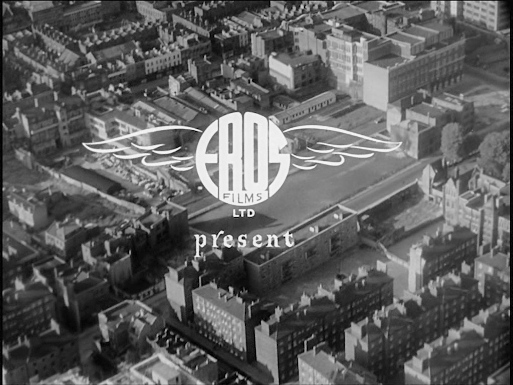 Aerial view of London. The right hand lower quarter contains the Peabody Estate bounded by Roscoe Street and Whitecross Street, EC1 Circa 1956