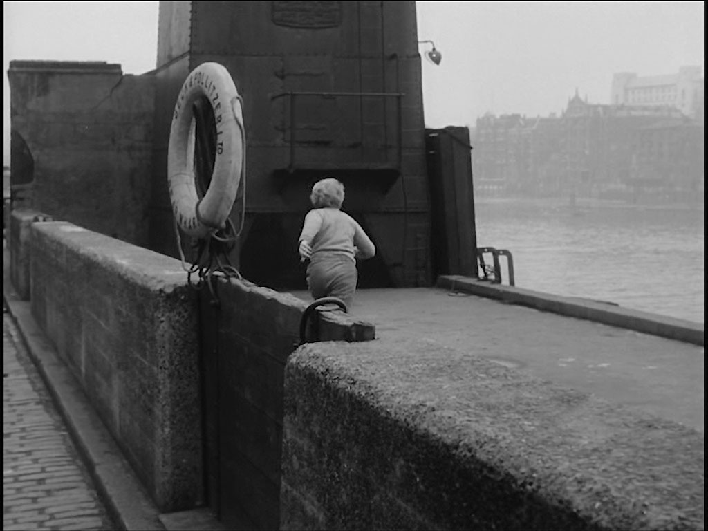 The jetty of Bear Wharf, Bakside. The white building background right is the Faraday Building, Queen Victoria Street, EC4 Circa 1956