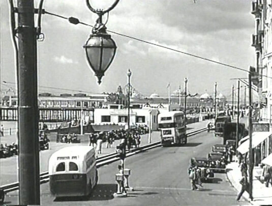 White Rock and the corner of Robertson Street, Hastings looking west with the pier going off to the left. Circa 1956