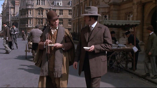 Castle Street, Oxford with New College Lane going off the right. ‘Arthurs Eel Bar” is outside ‘Hertford College’.