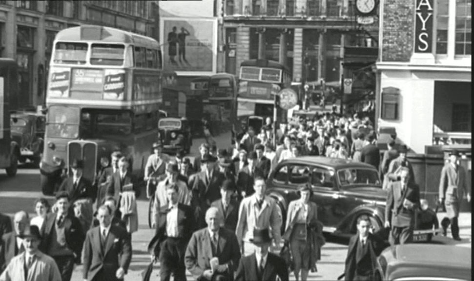 King William Street, EC4 with Monument Street off to the right. Circa 1961