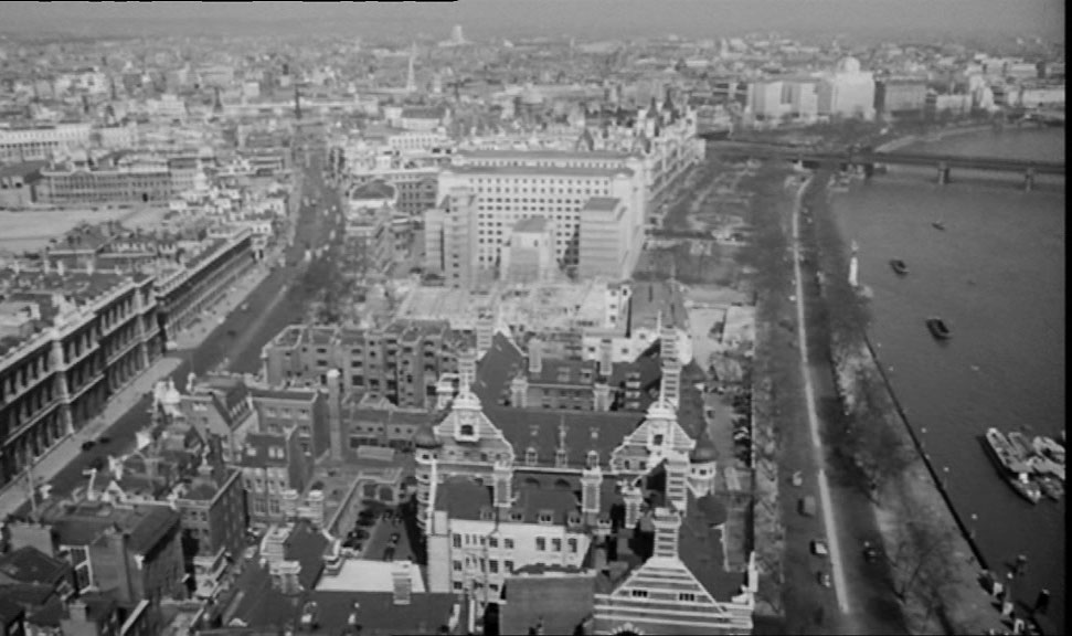 The aerial view looking north over Scotland Yard towards the white building of the Ministry of Defence. Circa 1961