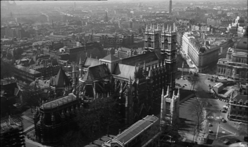 An aerial view of London with Westminster Abbey dominating the capture, looking as though the shot was taken from Elizabeth Tower. Circa 1961