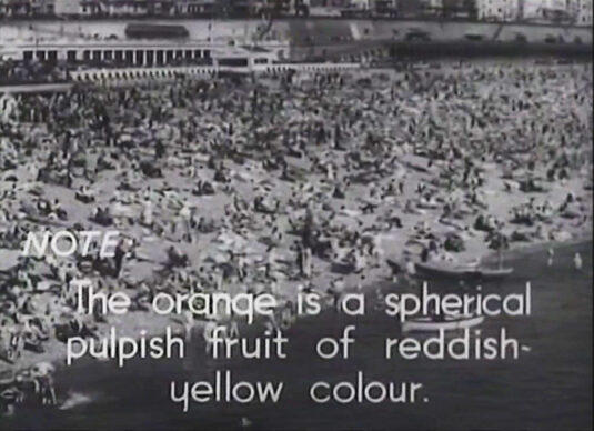 Brighton beach with Madeira Drive in the background and Volks Electric Railway just left of top center. Circa 1943