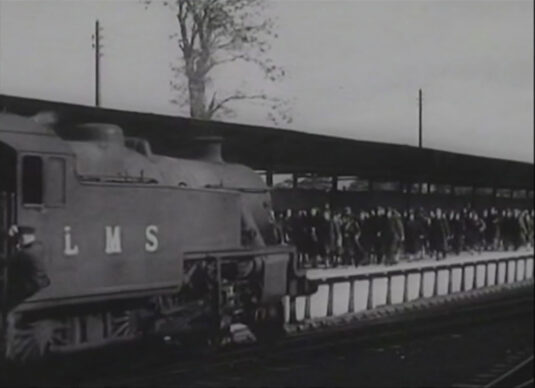 A Stanier Class 4P 2-cylinder 2-6-4T No. 2490 reversing out of Cold Meece station that served the Royal Ordnance Factory, Swynnerton. Circa 1943