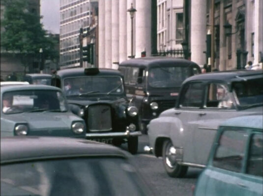 St. Martins Place looking towards St. Martins Lane WC2 The columns of St. Martins in the Fields to the right. Circa 1968