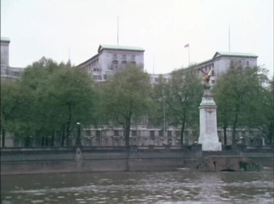 The white stone building with the green roof is the Ministry of Defence, Victoria Embankment with the white Royal Air Force Memorial prominent. Circa 1968