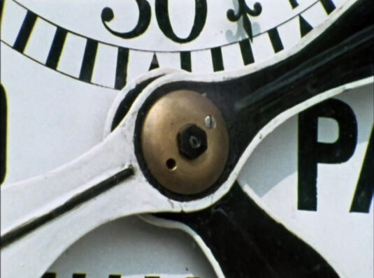 A close up of Greenwich Meridian clock Circa 1968
