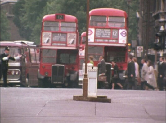 Looking north up Parliament Street, SW1 with Derby Gate off to the right behind the traffic lights. Circa 1968