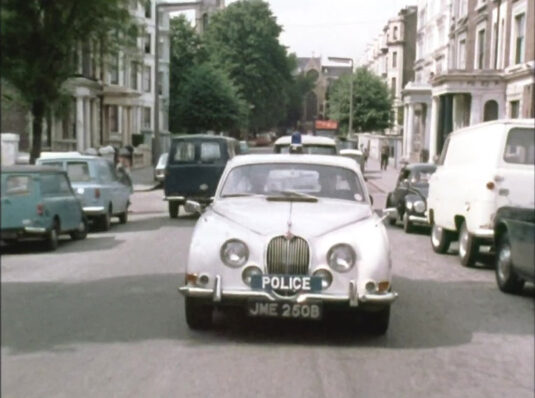 Colville Road, looking north towards All Saints church, Clydesdale Road, W11 Lonsdale Road off to the right. Circa 1968