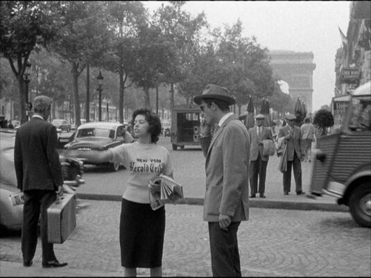 I believe this to be the Champs-Elysées junction with Rue Balzac, 8e given the word ?CINE?? extreme right and the cinema ?Le Balzac? that remains today. Circa 1960