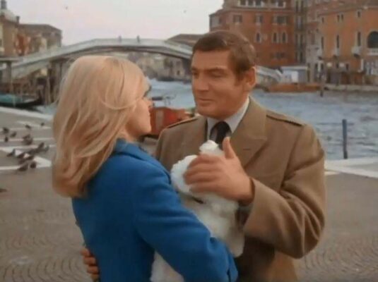Behind the two is the Ponte degli Scalzi spanning the Canal Grande. Circa 1968
