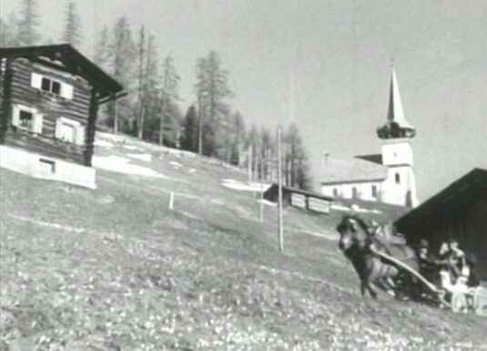 A view of the hillside and a closer view of the Reformierte Kirche, Davos Monstein Circa 1954