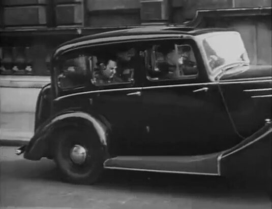 The corner of 1 Derby Gate, SW1 as it meets with Parliament Street. Circa 1936