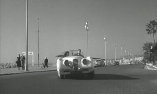 They drive eastwards towards the camera along Promenade des Anglais…… Circa 1958