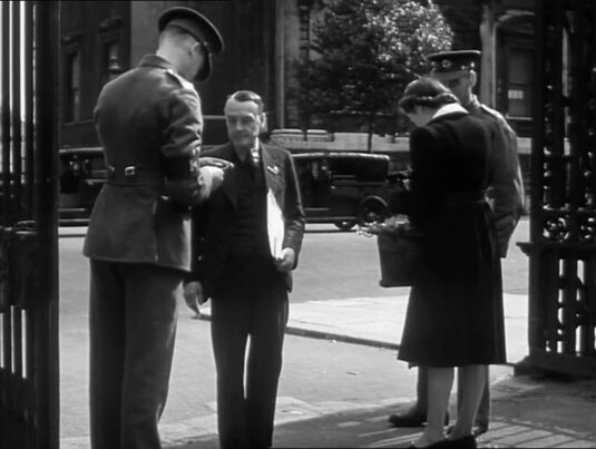 The gated entrance to Horse Guards looking outwards across Whitehall to the corner of Banqueting House and the junction with Horse Guards Avenue. Circa 1942