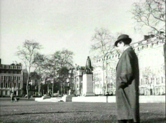 Grosvenor Square, W1 with the Roosevelt Memorial statute center capture. Circa 1949