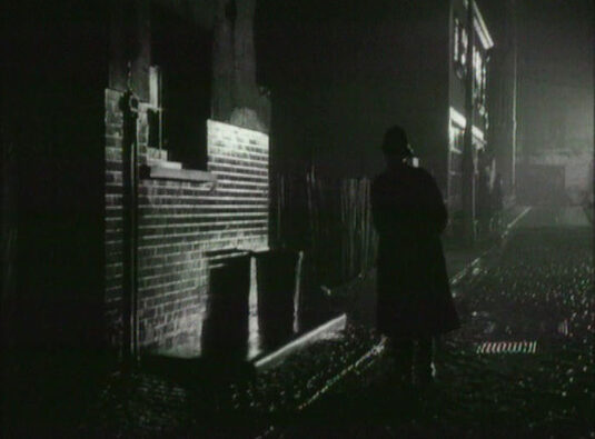 Blackburne's Mews, tthe properties in Upper Grosvenor Street can be seen in the background. Circa 1949