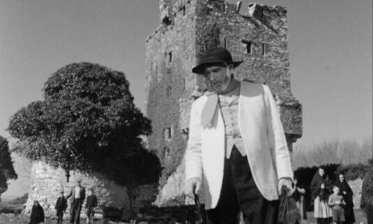Aughnanure Castle, in the background. Circa 1957