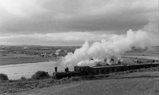 The 3’ narrow-gauge West Clare Railway, County Clare looking out to Poulnasherry Bay. Circa 1957