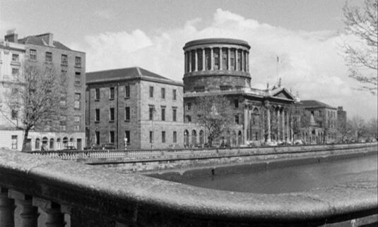 Looking across the River Liffey to Inns Quay and the dominant building of 'Four Courts'. Circa 1957