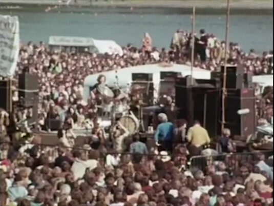 ‘Blind Faith’ are playing ‘Means To An End’. Hyde Park with the Serpentine. Circa 1970