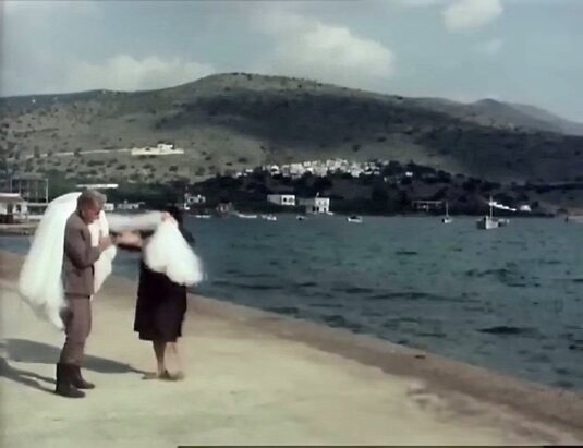 In this shot, the area of Mavrikiano is visible in the hills above Elounda. Circa 1977