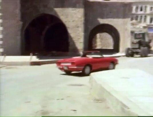 eof. Nearchou, Heraklion looking west. A 1965 Fiat 850 Spider. Circa 1977