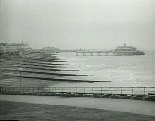 Eastbourne seashore and pier. Circa 1954