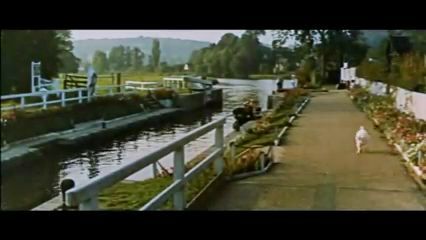 Hambleden Weir in Berkshire with Hambleden Mill in the right of centre background. Circa 1956